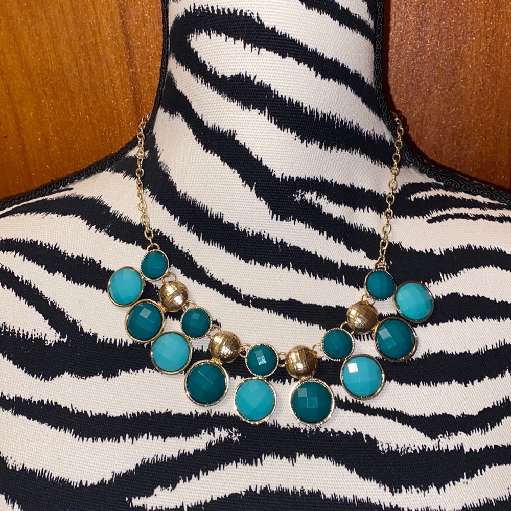 Green and gold colored beaded necklace